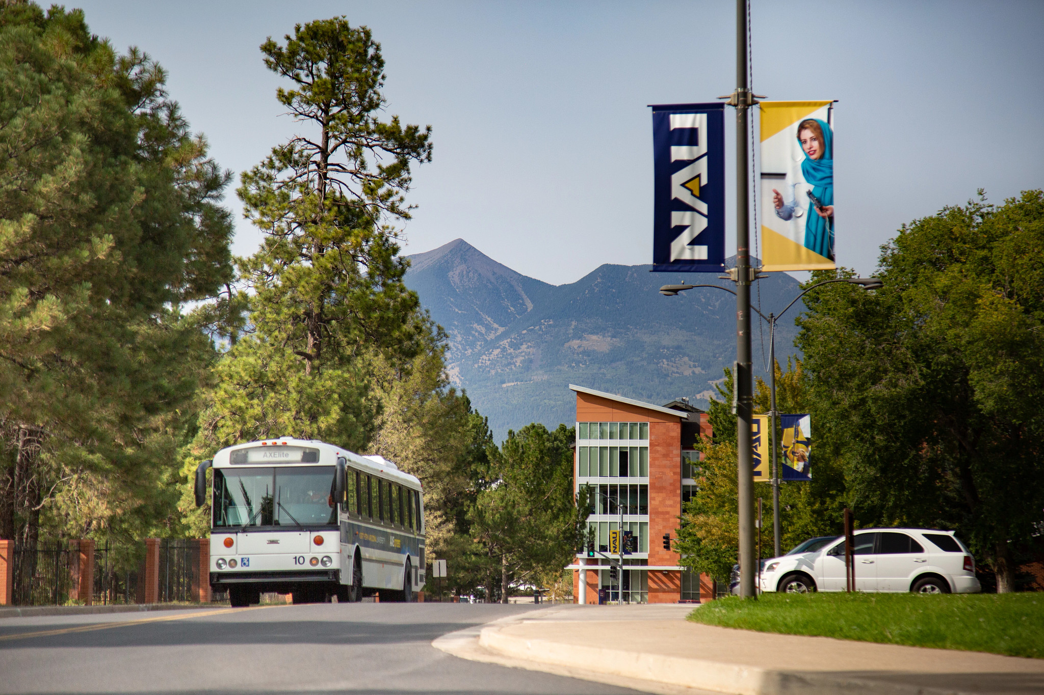 Bus on the road on NAU campus.