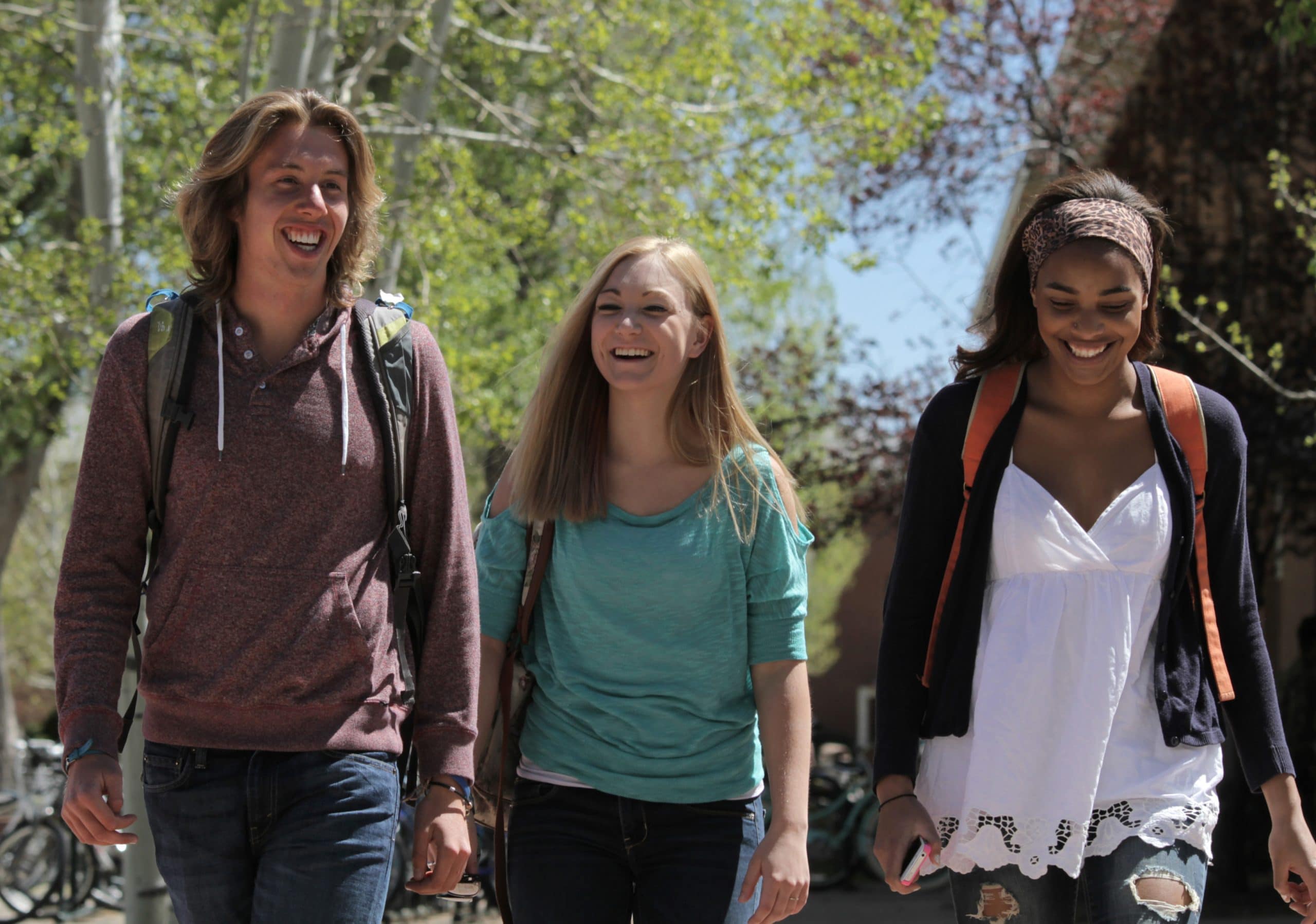 NAU students walking outside on campus.