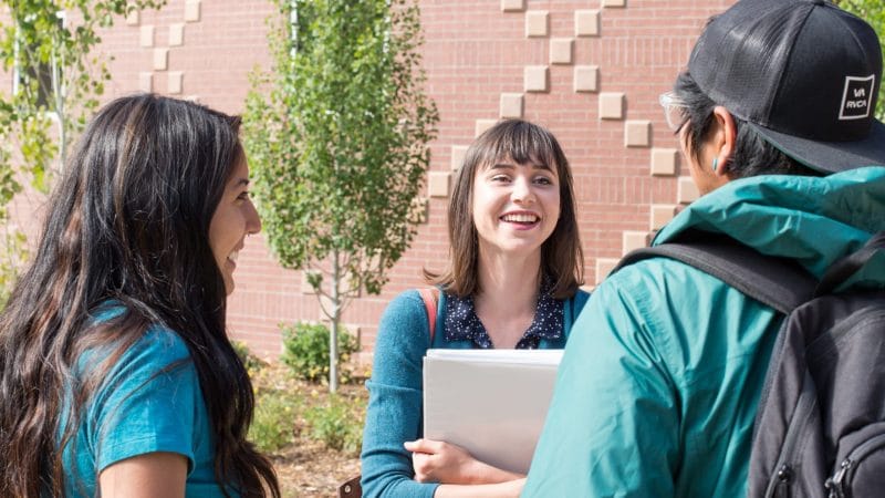 Students talking outside.
