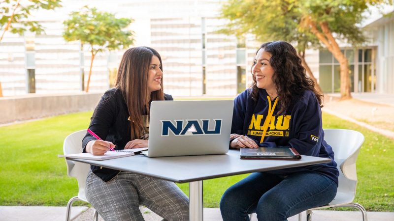 Students studying outdoors at the N A U–Yuma campus in southern Arizona.