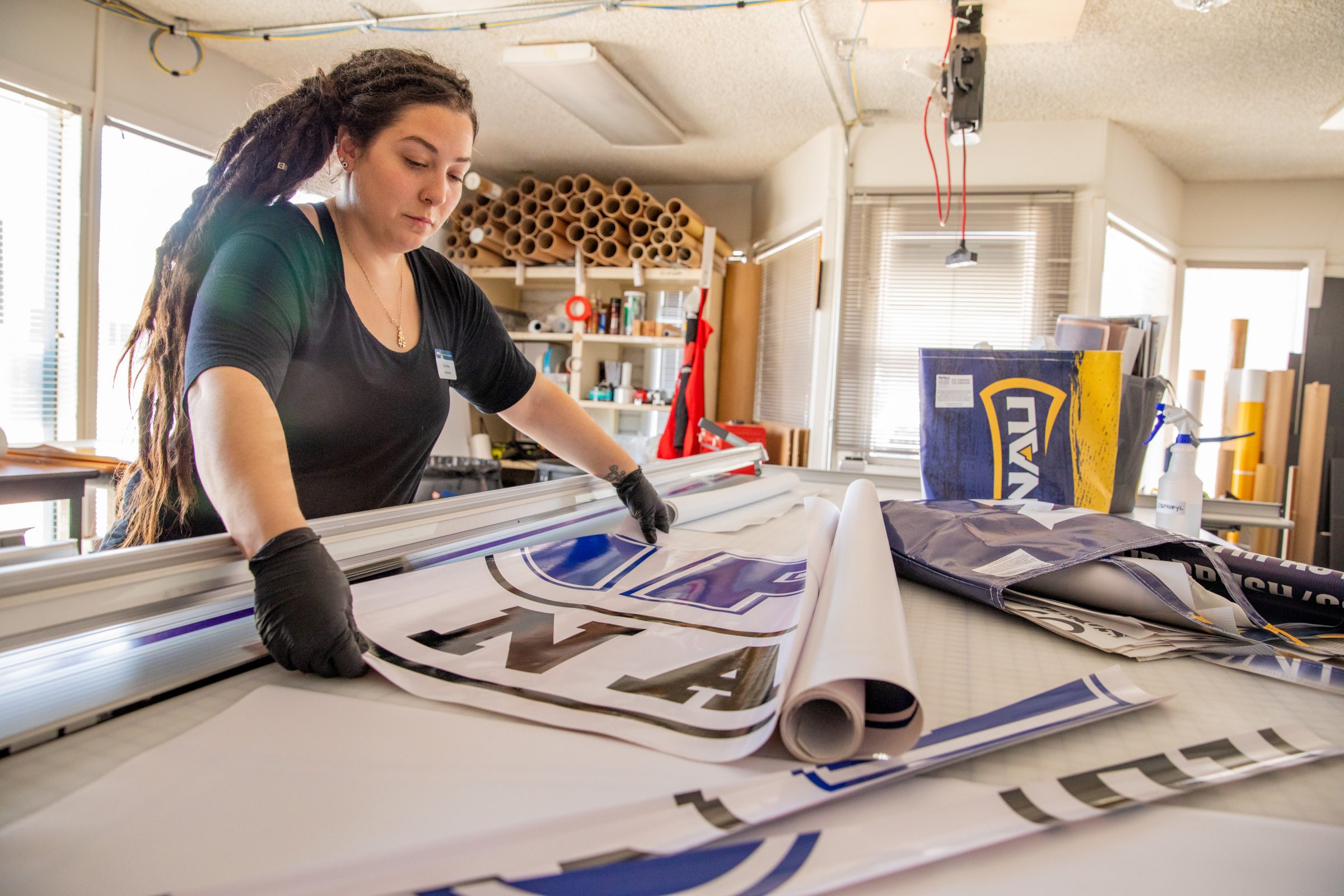 Sara LaRosa making banners for N A U.