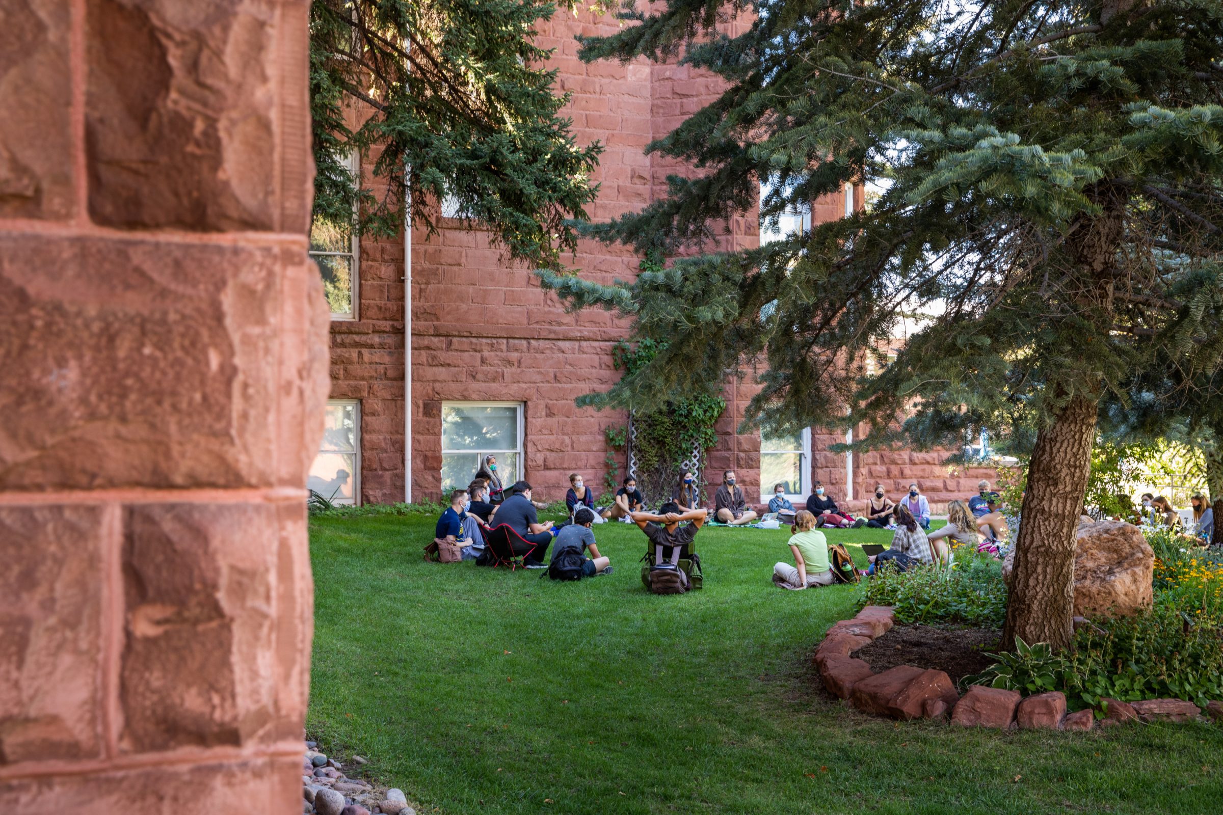 N A U faculty member leading class outdoors on N A U Flagstaff's North Quad.