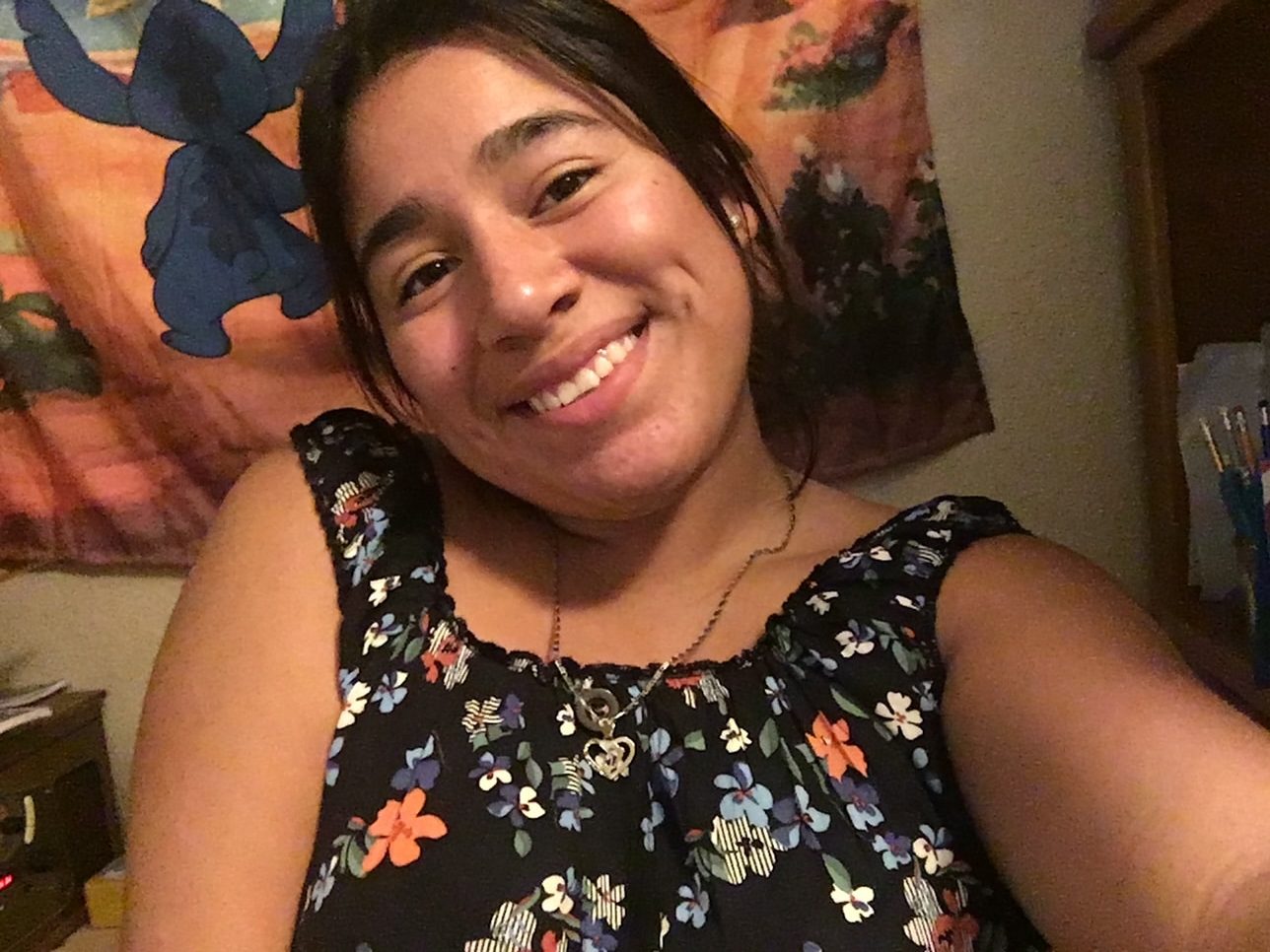 Student happily smiling.