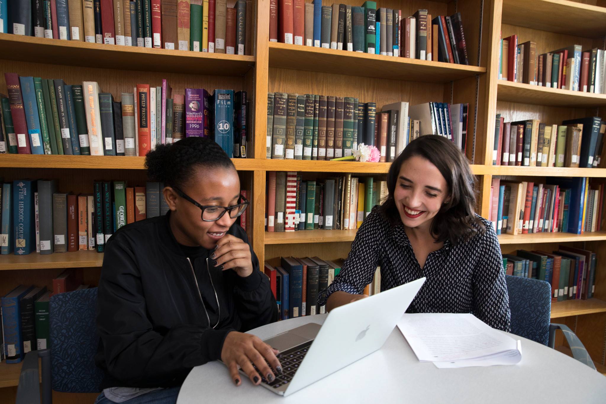 Two students study together at N A U.