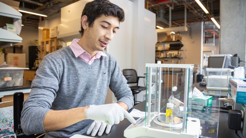 Student working in a lab setting.
