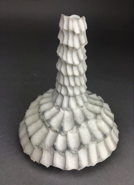 A scaled ceramic sculpture.