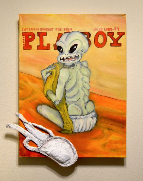 Painting of a Playboy cover with an alien.