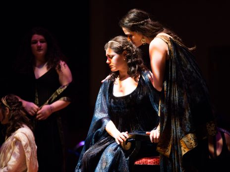 students acting in a play