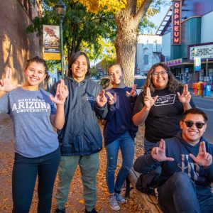NAU students posing on a street abroad.