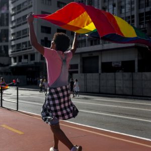 Woman holding pride flag