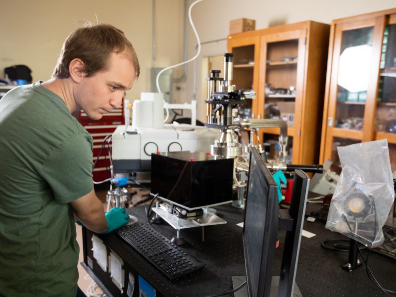 Mitchell Magnuson working in the PEAXS lab