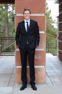 Kyle Killett posing on the NAU campus.
