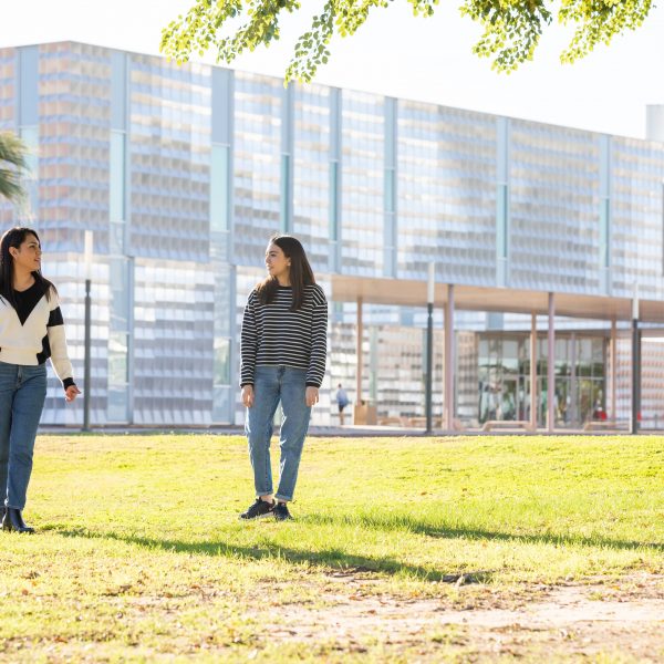 Two students walking on NAU-Yuma's campus.