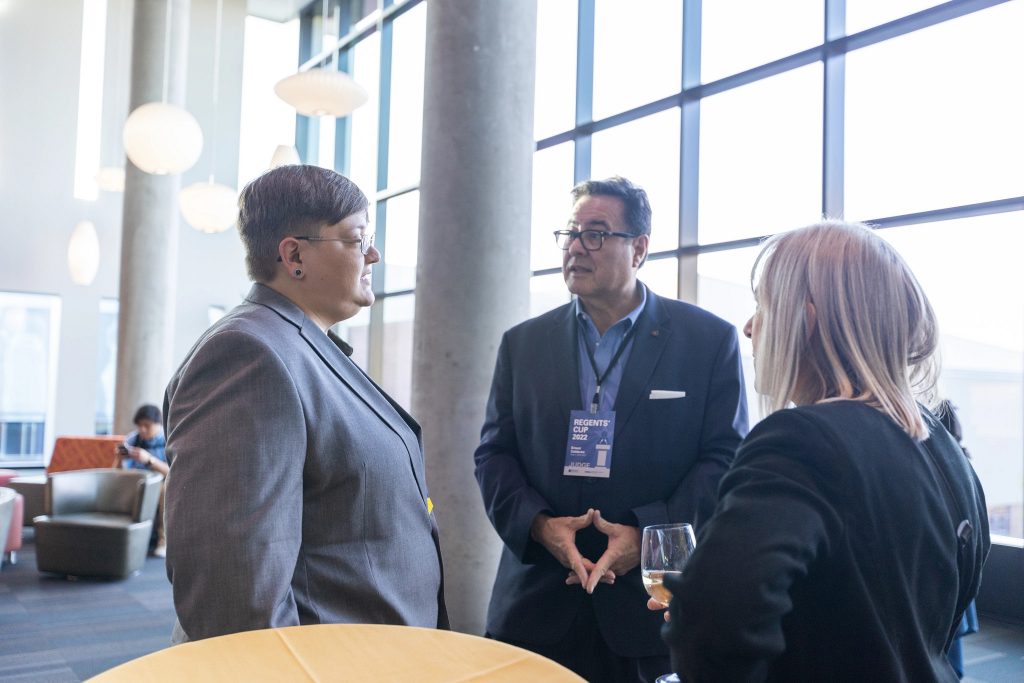 Professor Sarah Walker socializing during Regents' Cup reception.