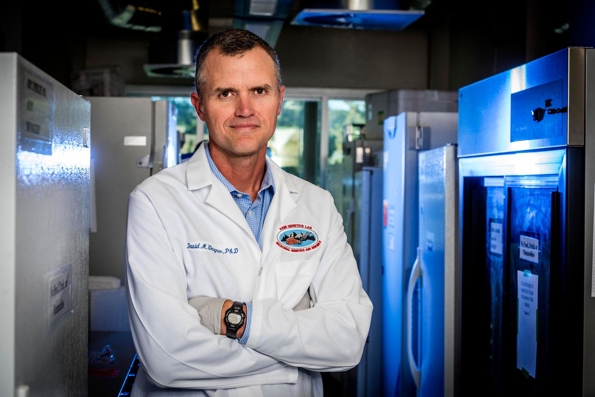 Pathogen and Microbiome Institute Acting Director Dave Wagner standing in the lab.