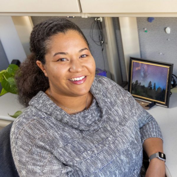 NAU graphic designer Charlese Bedford working on web accessibility.