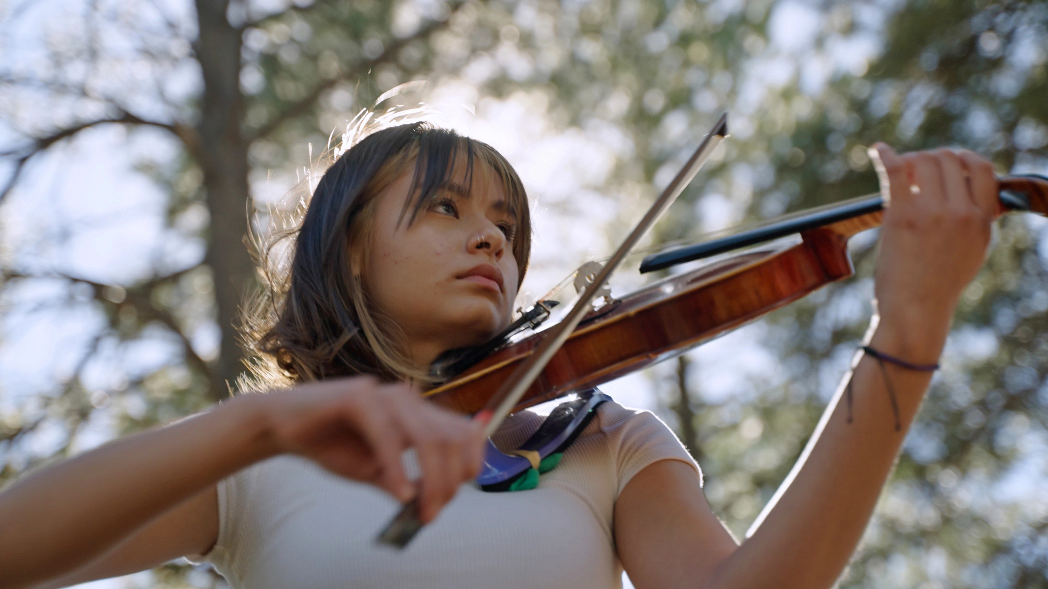 Honors sociology major and Flinn Scholar Kaya Dickson plays the violin.