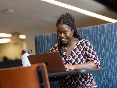 A student working on their laptop