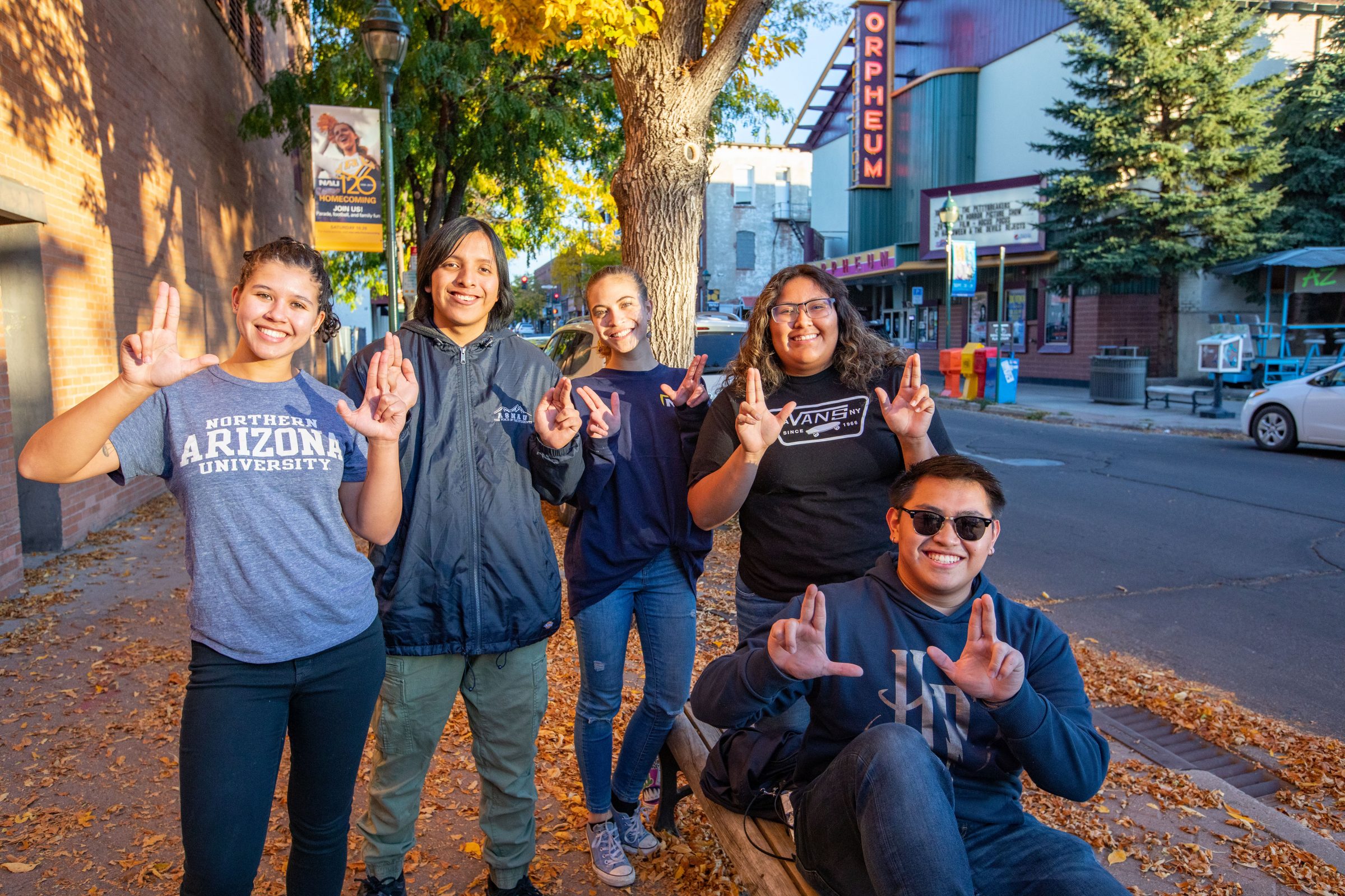 Lumberjack students in downtown Flagstaff by the Orpheum.