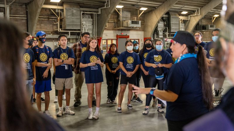 Students with Ann Marie Chischilly in the field house.