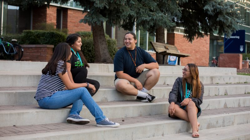 Students sitting on steps at N A U.