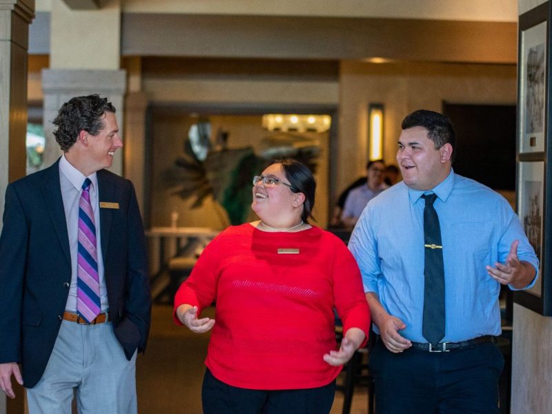 An H R M student taking a tour of a hotel.