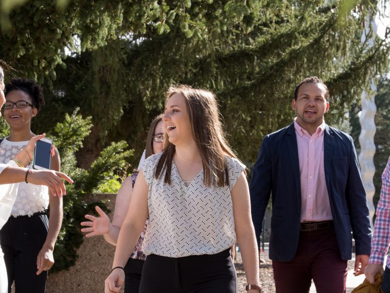 Franke ambassadors walking outside towards the business college.