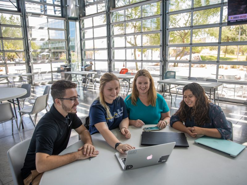 Students working together on a computer.