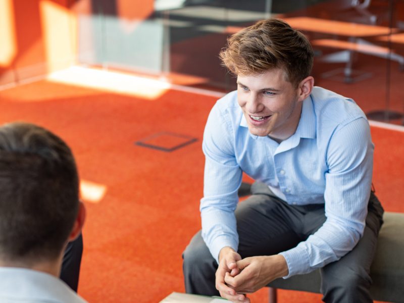 Business students collaborating in a lounge.