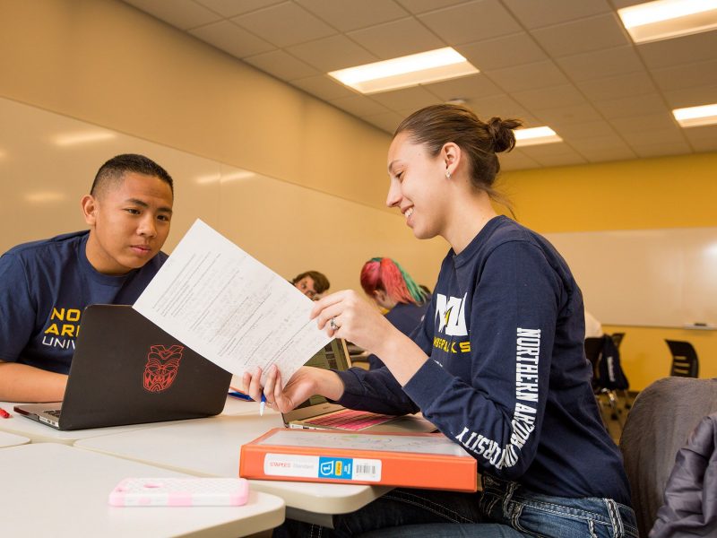 Student teaching other student.
