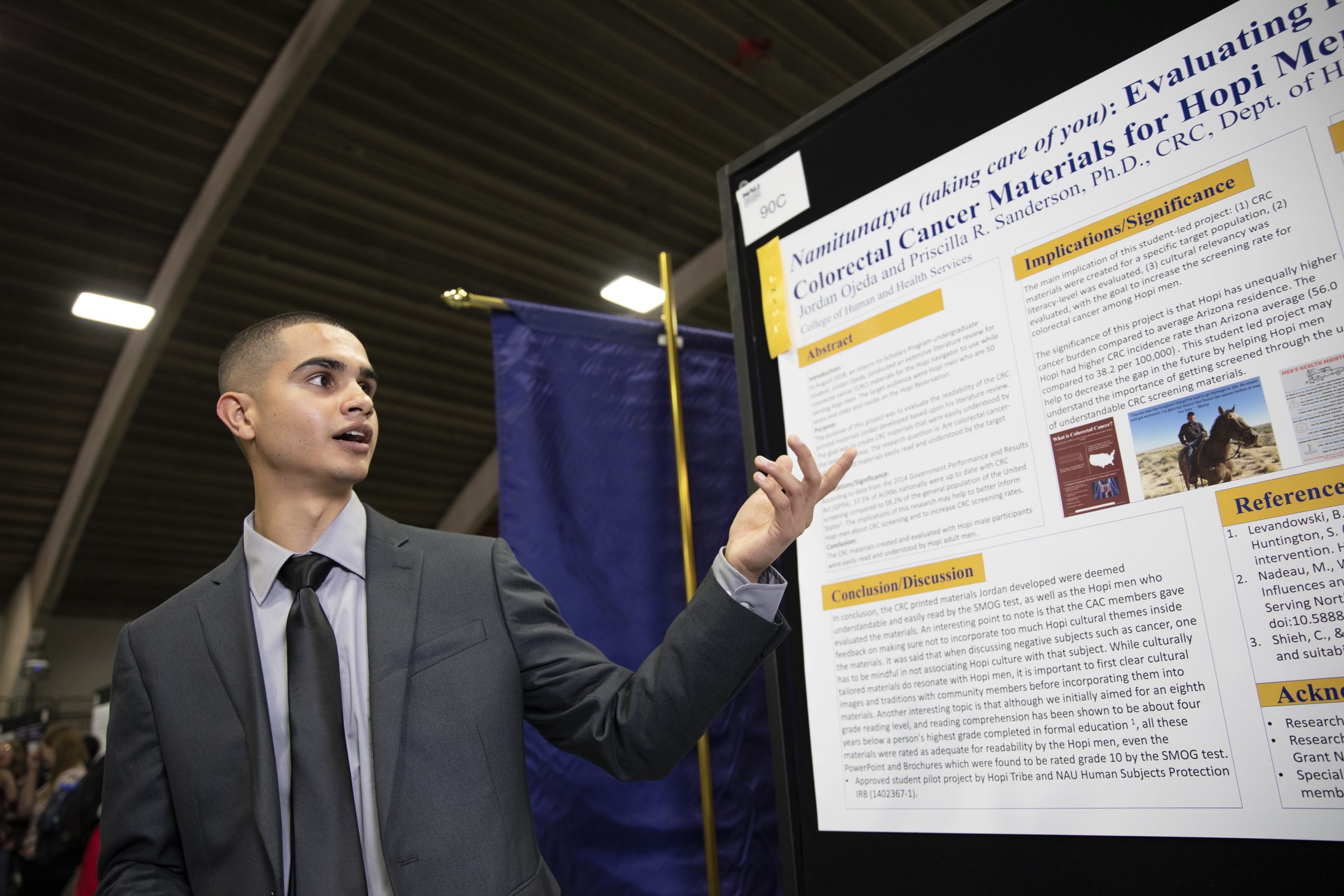 Student showing data to an audience.