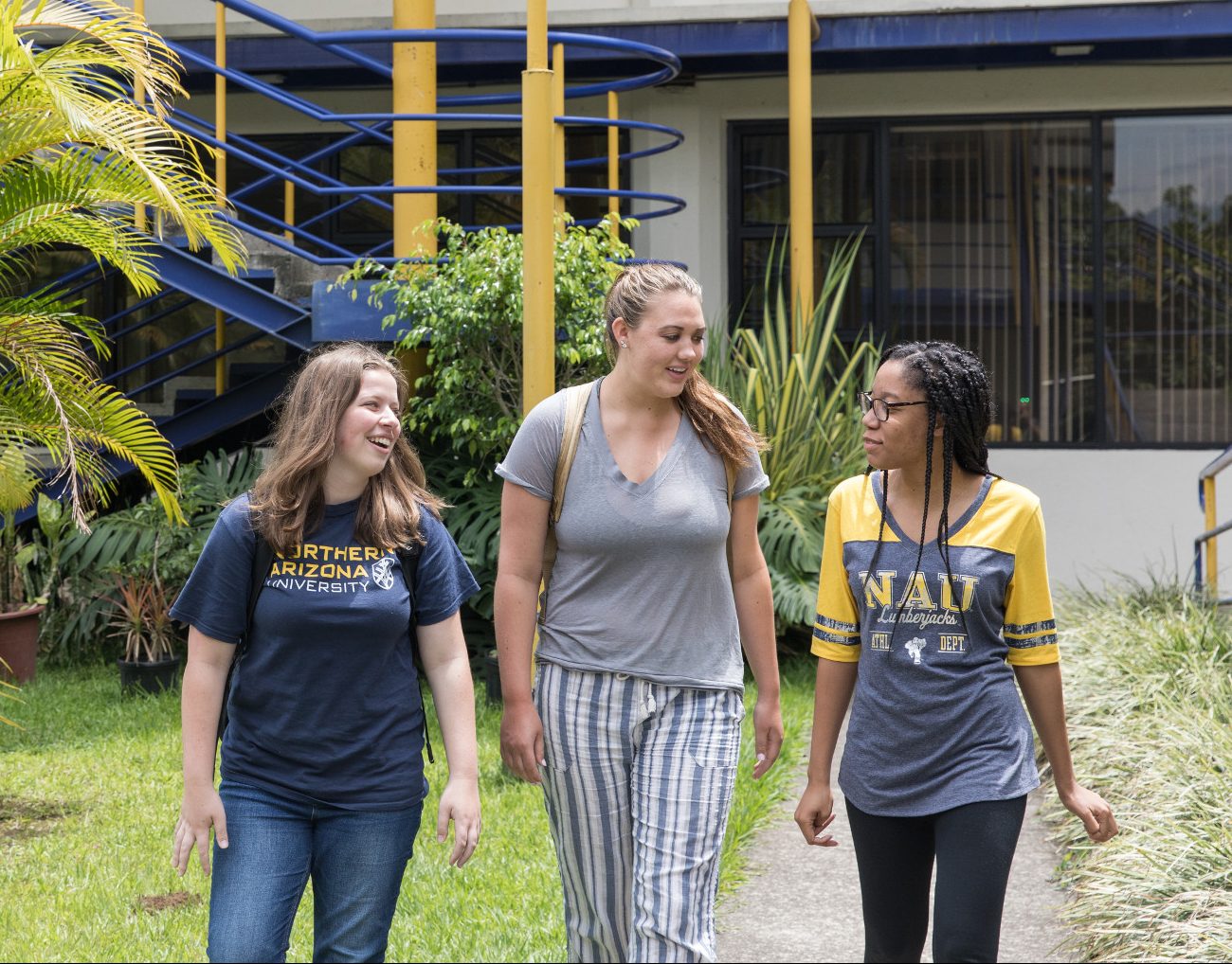 N A U students walking outside.