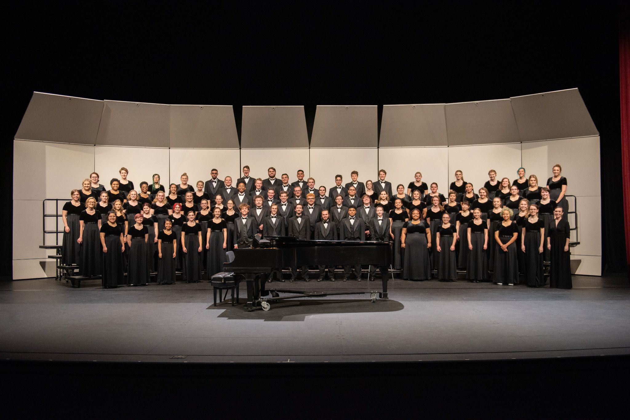 Shrine of the ages choir on stage with piano.