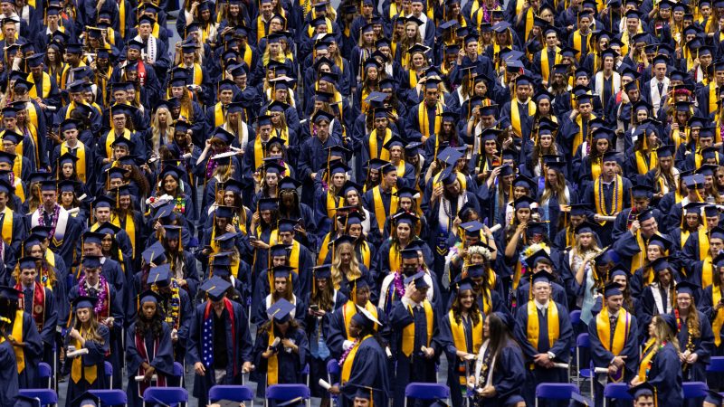 NAU students sitting during commencement ceremonies