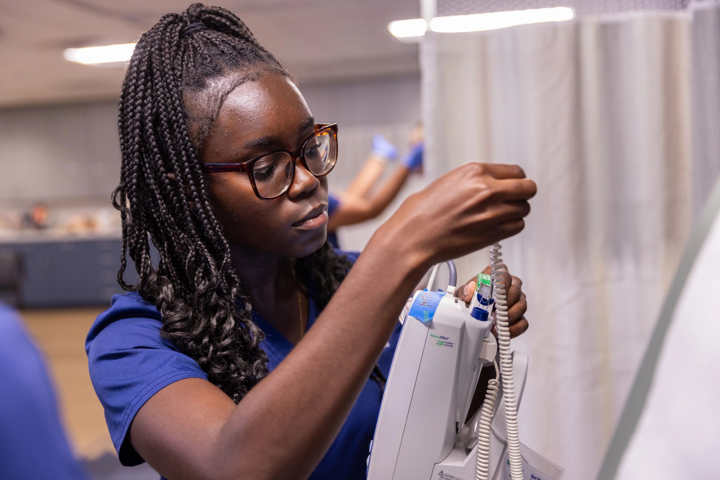 A nurse working in a hospital.