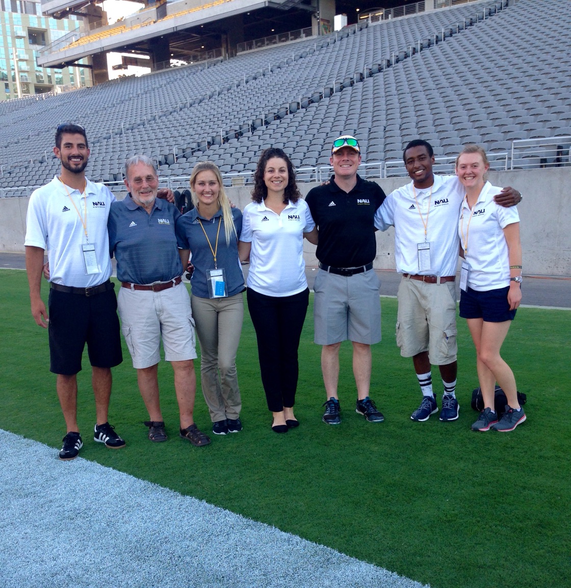 Ryan Tiscareno, N A U Athletic Training graduate poses with fellow trainers.