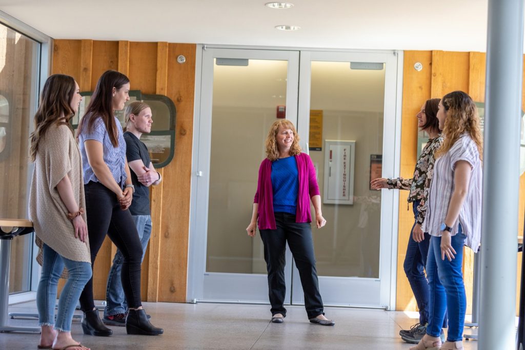 Dawn Clifford, center, believes a weight-inclusive approach to teaching could help the next generation provide more compassionate care, leading to better health outcomes for everyone.