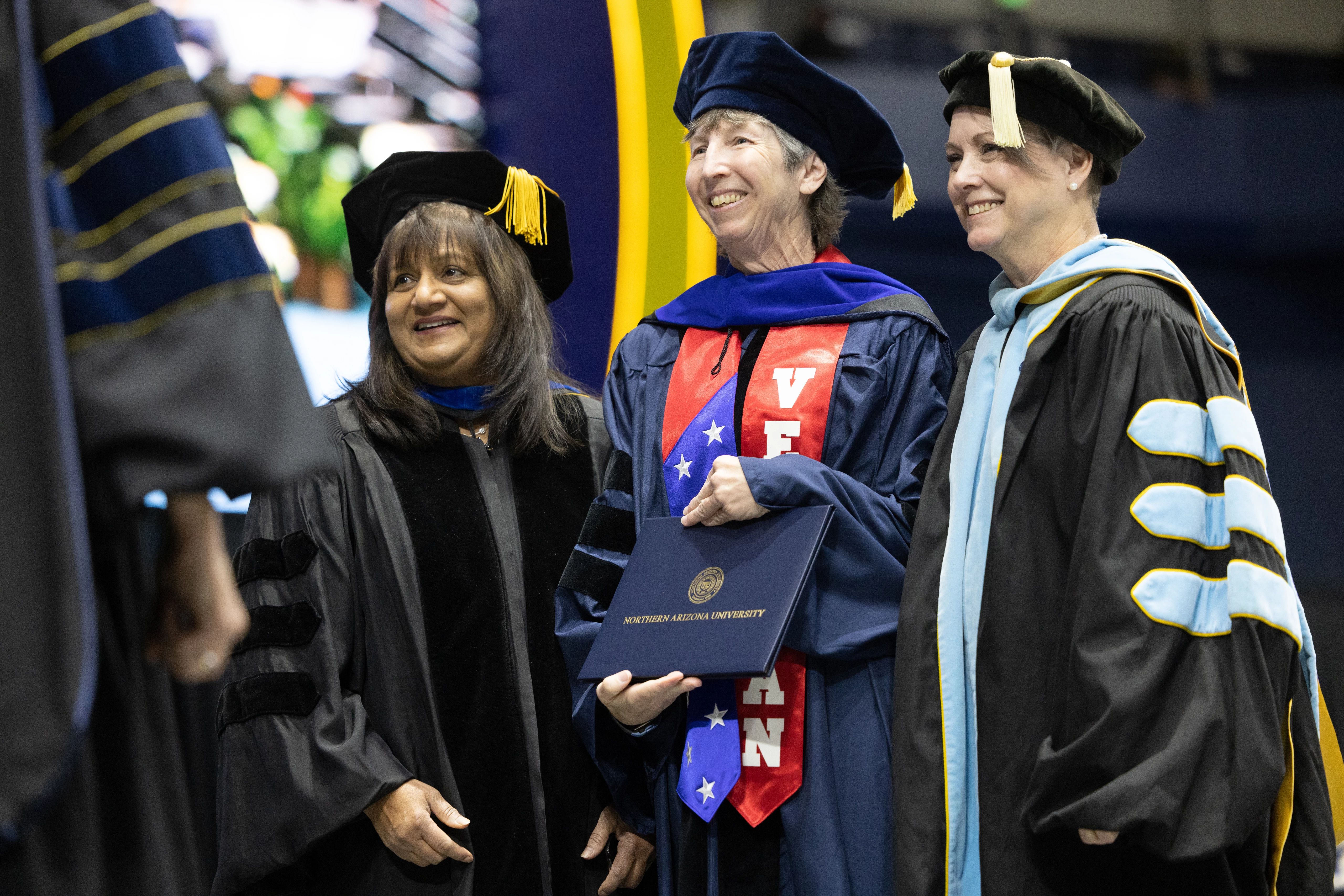 Graduate receiving award.