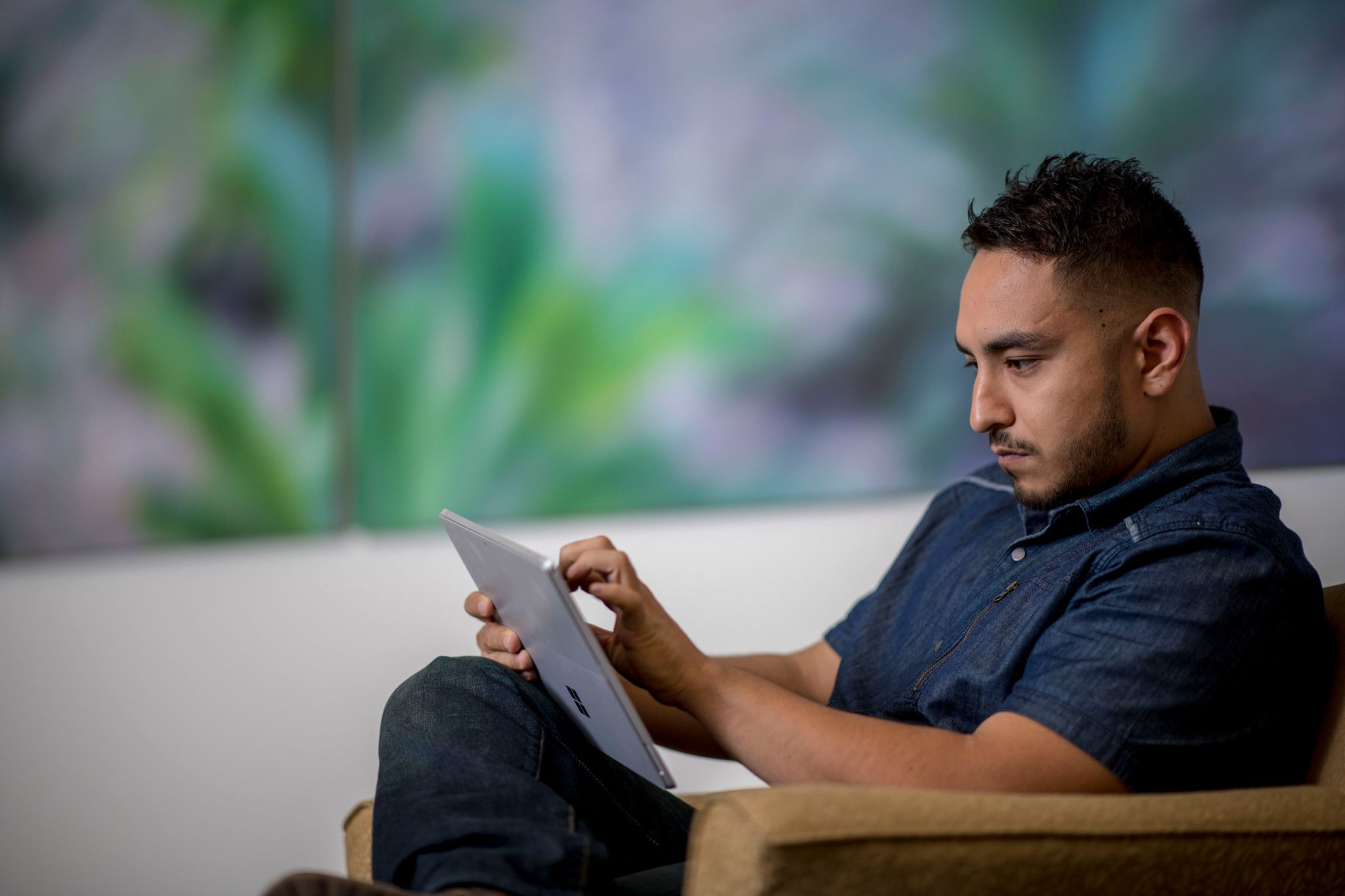 Student working on a tablet.