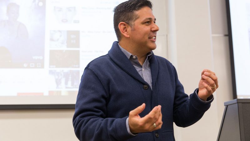 Faculty presenting in a classroom.