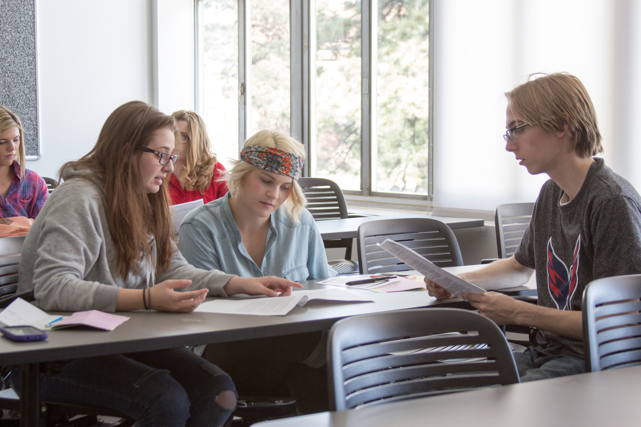 N A U students working together in a classroom.