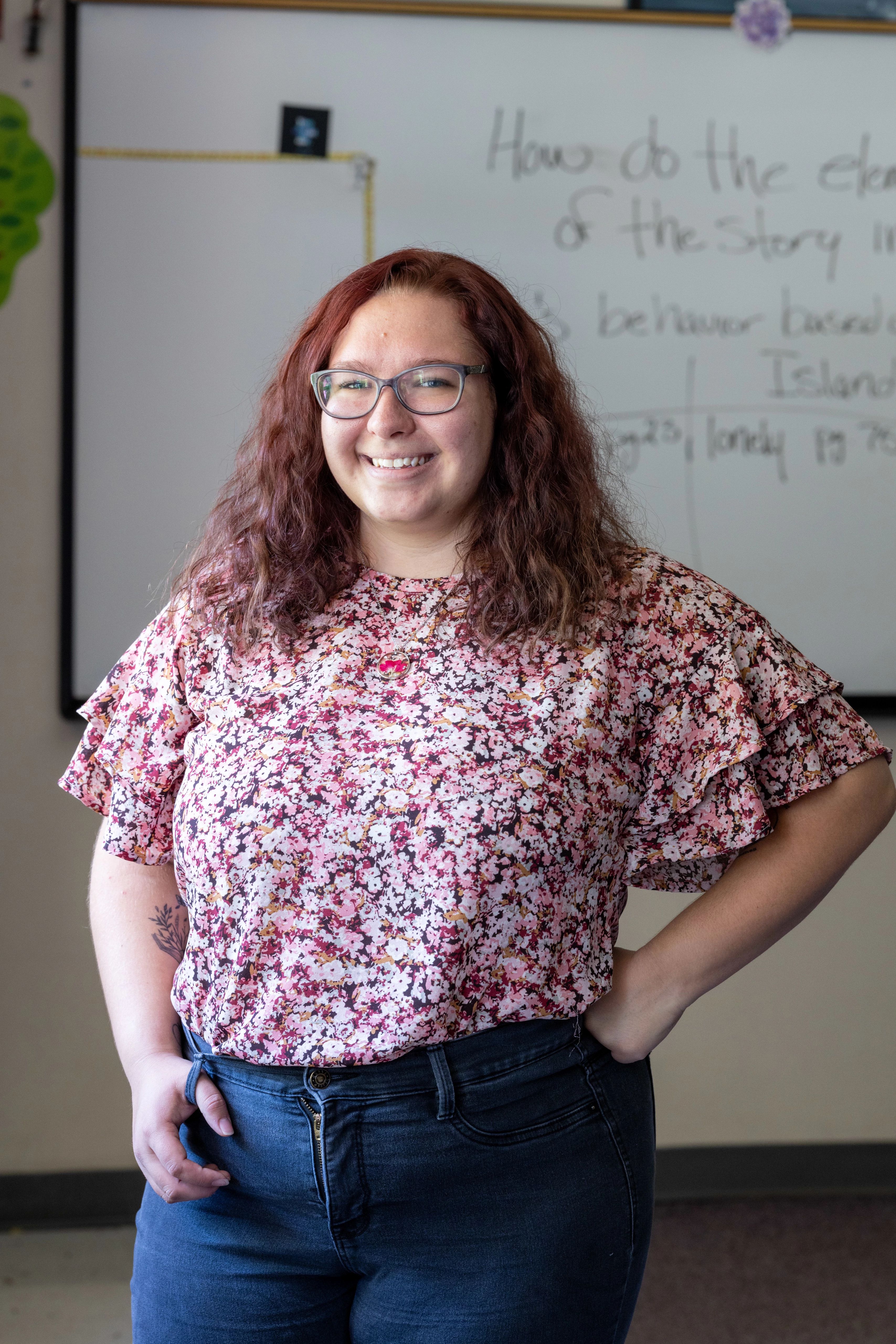 N A U student teacher posing for photo in classroom.