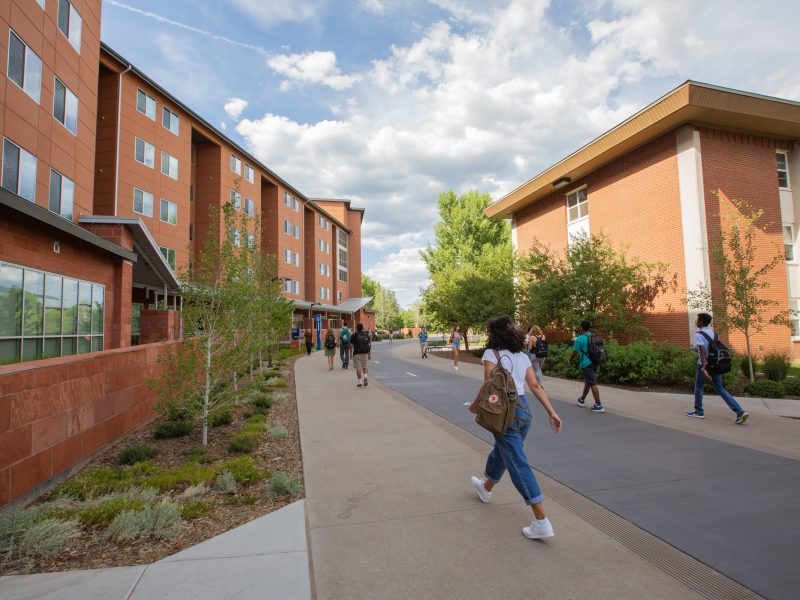N A U students walking on campus.