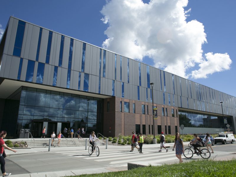 N A U student walking around campus.