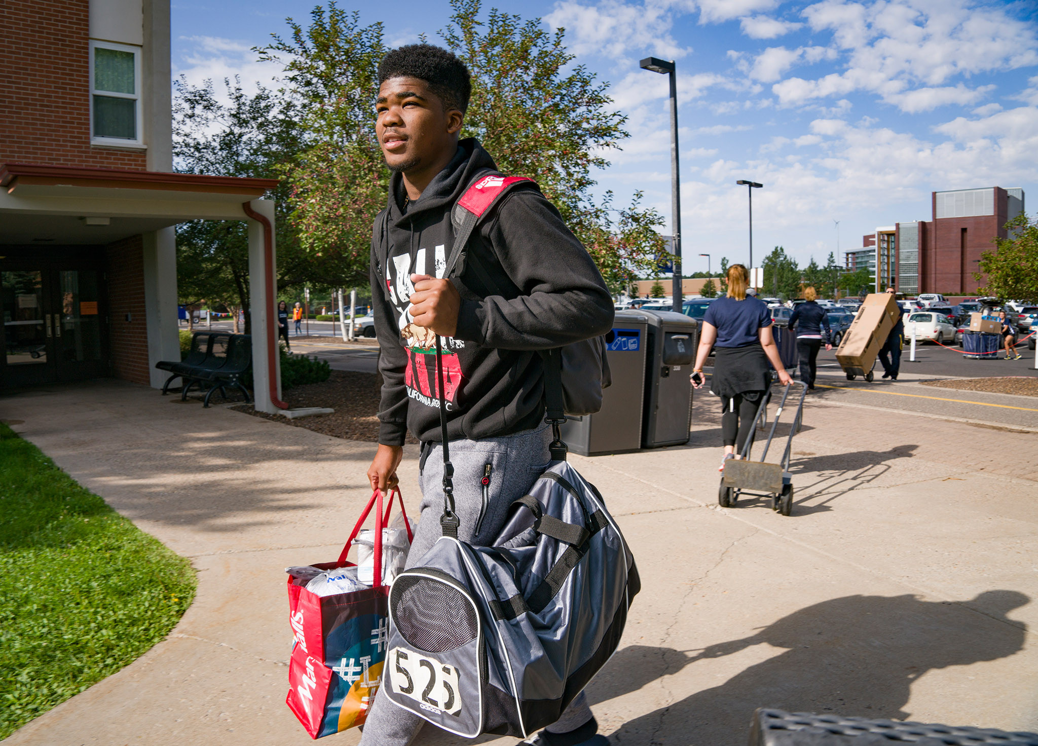 A photo of a student moving in.