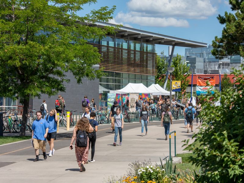 A photo of N A U students walking outside of the Union.