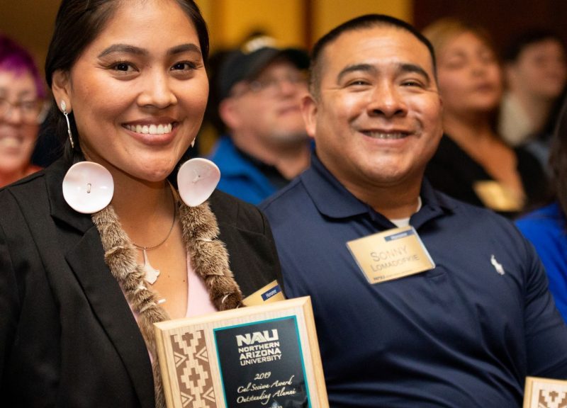 A 2019 Diversity and Equity award winner smiling for a photo.
