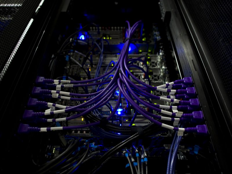 Wires that are connected to a computer.