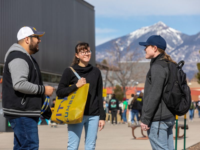 Students outside on the N A U campus.