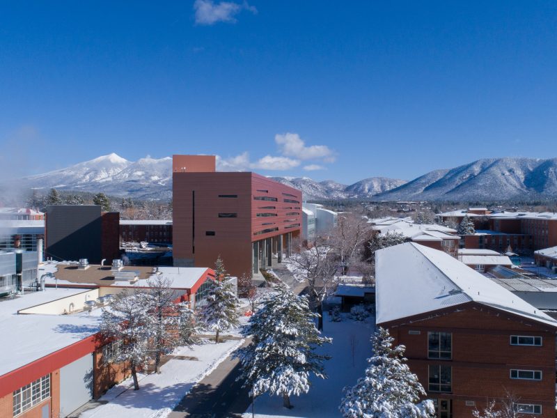 Drone photo of Flagstaff campus on a snowy day.